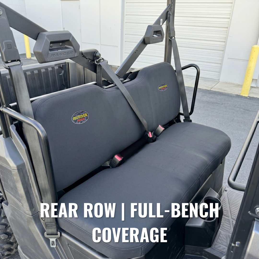 MudderSwag padded neoprene seat covers installed on Polaris Ranger Crew 570 Full-Size rear row showing solid full-bench backrest and solid full-bench bottom cushion coverage